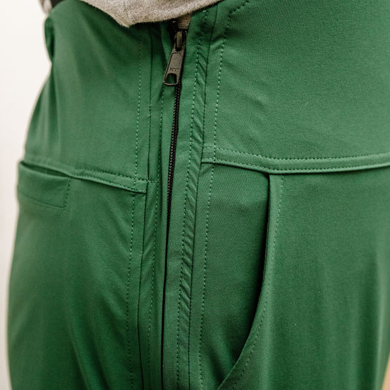 side zipper on green overalls